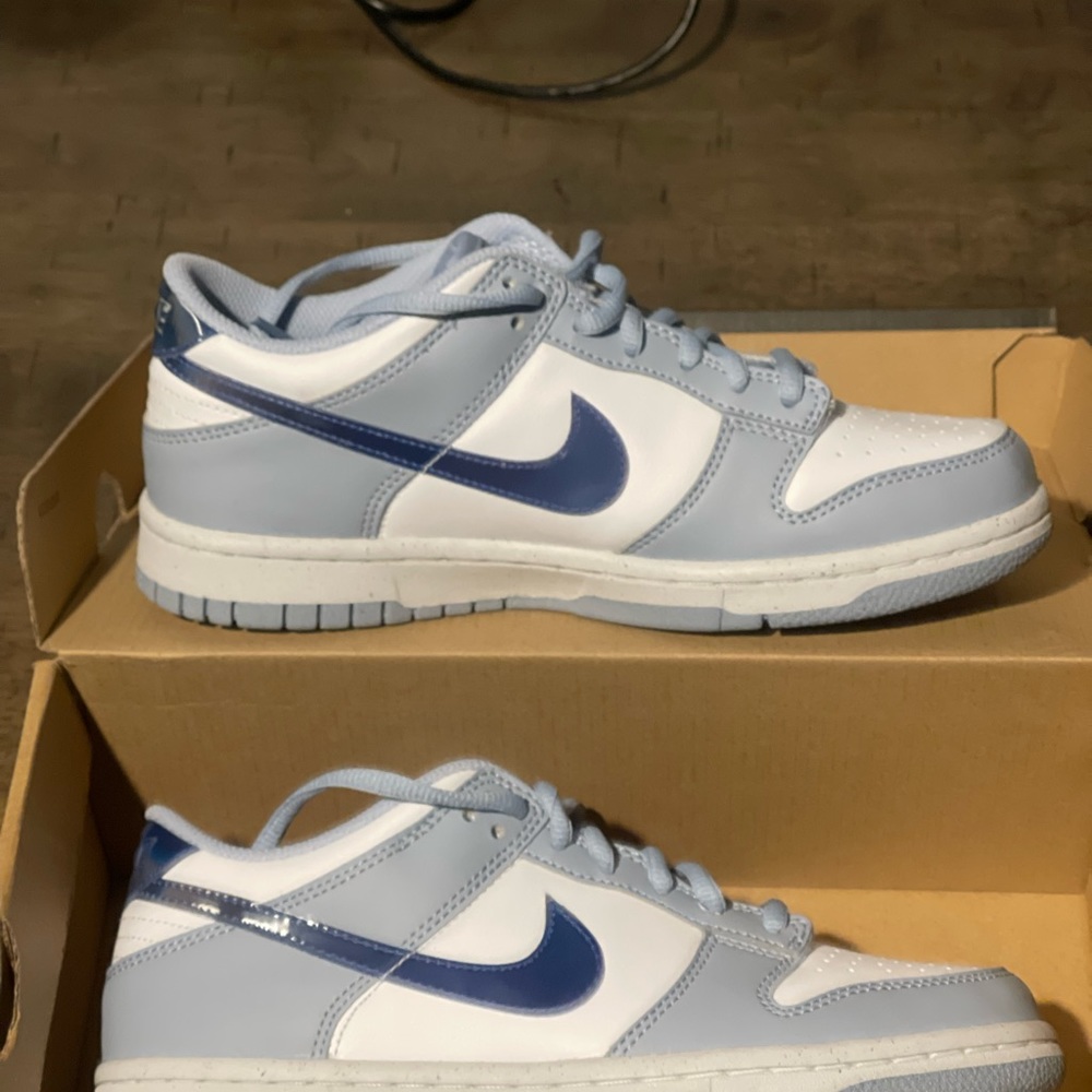 Nike Dunks Brand New!
Blue Whisper/Hyper Royal/ Green Abyss/White
Size 5.5Y